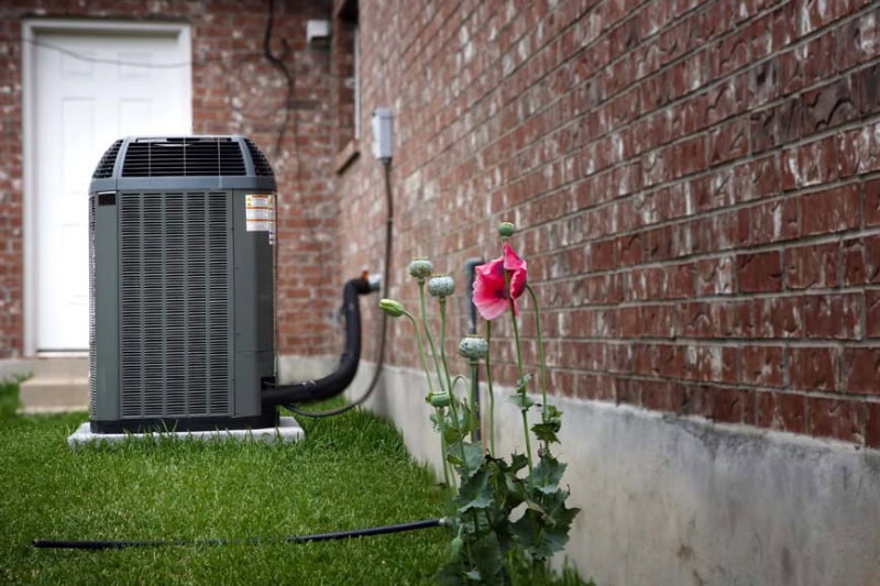 An image of an AC unit outside.
